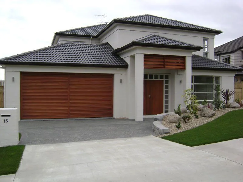 A cedar louvre garage door from The Garage Door Shoppe's range