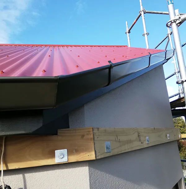 Bevelled rakes continuous spouting on a Hawke's Bay home